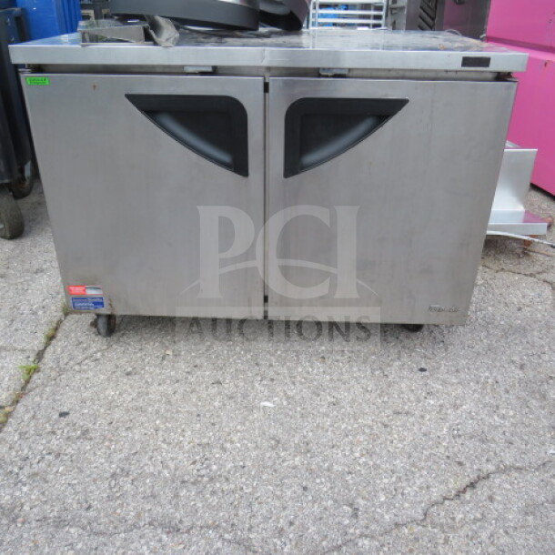 Turbo Air 2 Door Worktop Refrigerator, Model TUR-48SD-N, stainless steel, on casters, 115 Volt, includes 2 racks.