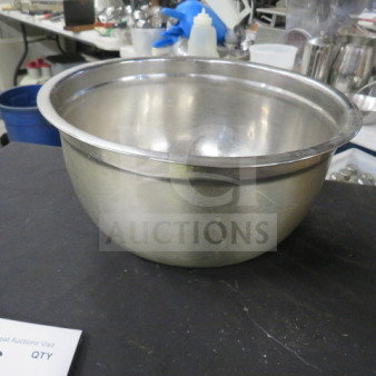 12x6.5 stainless steel mixing bowl, polished finish, gently used condition, no visible dents or scratches.