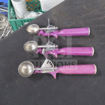 Three purple handle dishers, model 3XBID, in used condition, showcasing sturdy stainless steel scoops and ergonomic grips.