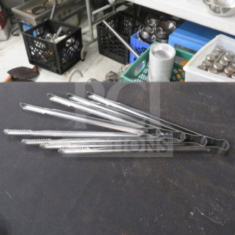 12-inch stainless steel tong set, model 4XBID, in good condition. Features serrated edges for grip.