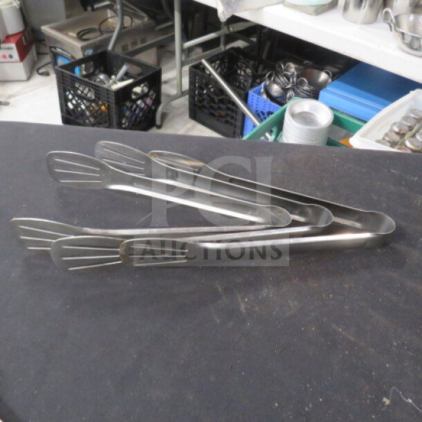 9.5 inch stainless steel tong, 3XBID model, sleek design, durable, ideal for kitchen use, gently used in good condition.