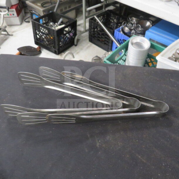 10-inch stainless steel tong, durable construction, excellent condition, model 2XBID, ideal for kitchen use.