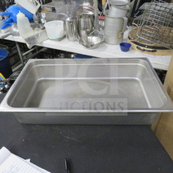 Full-size 4-inch deep hotel pan, stainless steel, used, rectangular shape, ideal for catering or food service.
