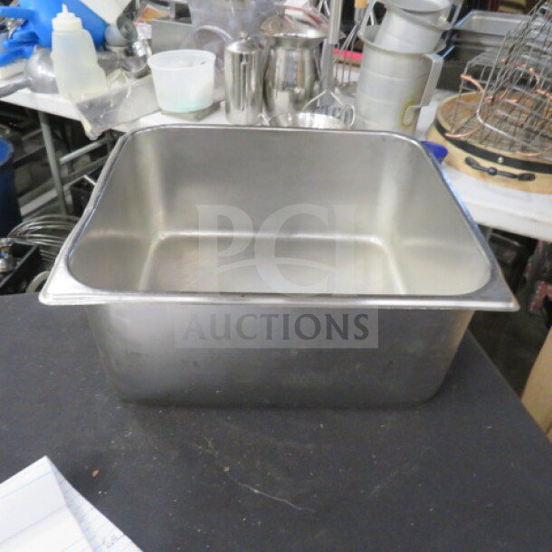 3/4 Size 6 Inch Deep Hotel Pan, stainless steel, used, clean condition, suitable for commercial kitchen use.