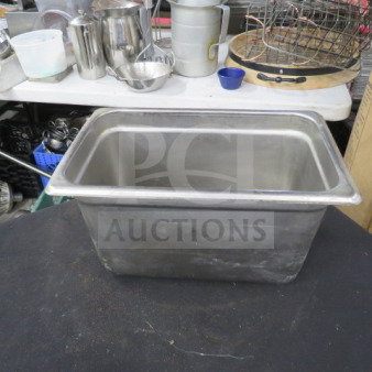 1/4 Size 6-Inch Deep Hotel Pan; stainless steel, used condition, visible wear; essential kitchen equipment.