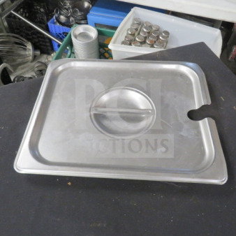 Stainless steel 1/2 size lid with handle, model 5XBID, in good condition.