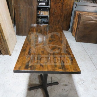 Solid wood butcher block table top, 1.5-inch thick, on dual pedestal base. Dimensions: 72x39x30 inches. Polished finish.