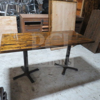 Solid wood butcher block table top, 1-1/2" thick, on dual pedestal base. Dimensions: 60"x28"x30". Good condition.