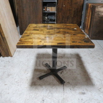 Solid wood butcher block table top, 1-1/2" thick, on sturdy pedestal base, 30"x30"x30", excellent condition.
