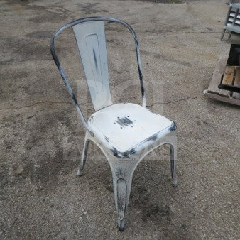 Vintage look white washed industrial metal chair, distressed finish, weathered patina, sturdy construction.