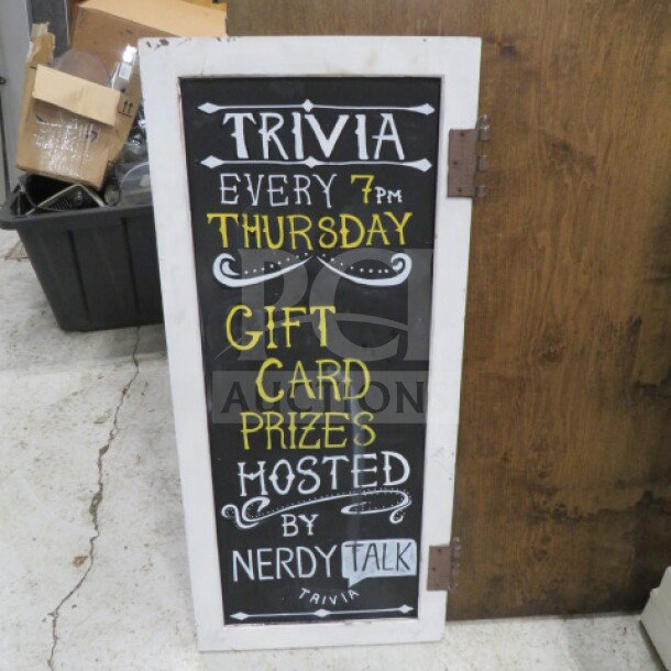 16x36 white wooden framed chalkboard with "Trivia" event details and decorative text. Good condition.
