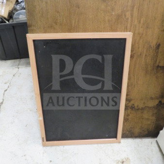 Wooden framed chalkboard, 17x23 inches. Simple design, good condition. Perfect for home or business use.