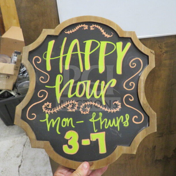 12x14 wooden framed chalkboard with decorative edges. Bright lettering says "HAPPY hour Mon-Thurs 3-7" in neon colors.