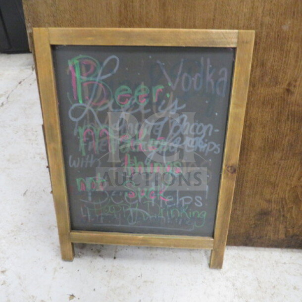 12x16 wooden framed chalkboard with colorful chalk writing, in good condition. Suitable for home or business use.