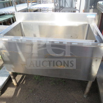 BK Stainless Steel Ice Well, Model UB4-18-IBCP36, 36x18x32.5 inches. Used condition with visible wear and labels on top edge.