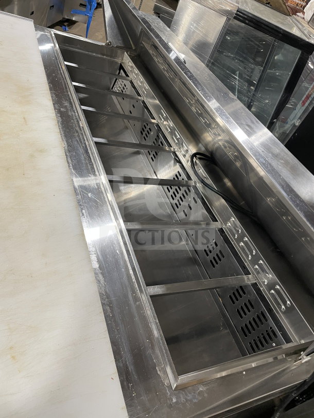 Berg 60" stainless steel 2-door prep table, model BERGS60, with poly-coated wire rack, lightly used condition.