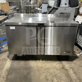 Berg Commercial Stainless Steel 60" Solid 2-Door Prep Table, Model BERWT60R, with poly-coated rack, used condition.