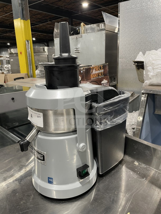 Waring Commercial Heavy-Duty Juice Extractor WJX80X, countertop model in good condition, 120V, features pulp ejector.