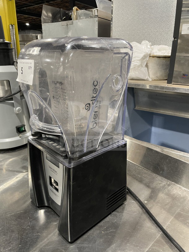 Blendtec Q-Series ICB5ABC5 commercial blender, black base, clear jar, minor wear, working condition, labeled for auction.