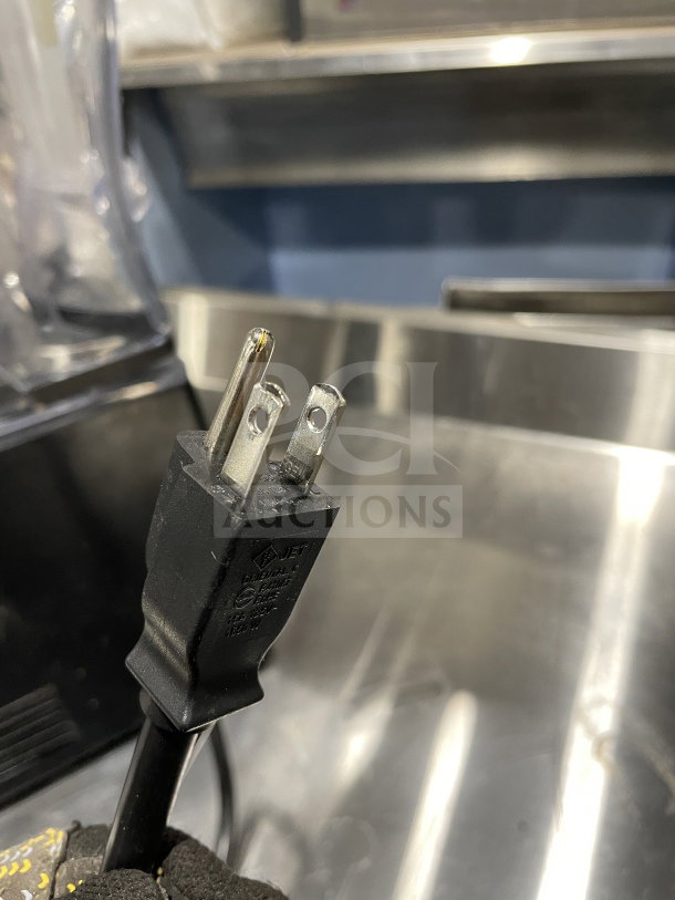 Blendtec Q-Series ICB5ABC5 commercial blender plug, showing standard prongs and marking details. Working condition.