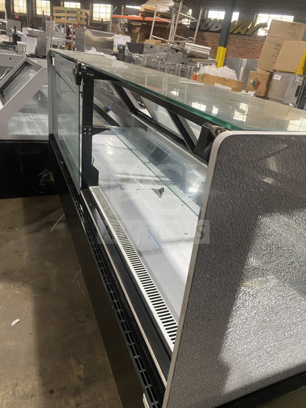 Senkar 8Ft NETA8FT refrigerated bakery display case, black base, clear glass, double compartment, like new, on casters.
