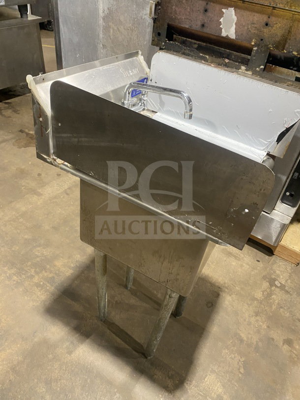 L&J commercial stainless steel hand sink with dual side splashes, splash-mount faucet, and legs. Used condition.