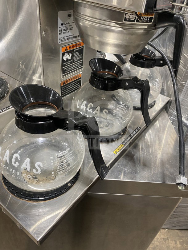 Bunn stainless steel coffee brewing machine with 5 warming stations, hot water dispenser, Model CRTF535, SN CRTF017730, 120/240V.