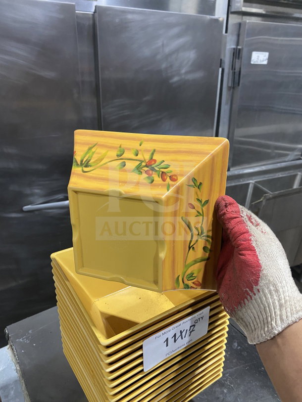 Commercial heavy-duty melamine plates in harvest-yellow with unique angular geometric design. Quantity: 17 plates.