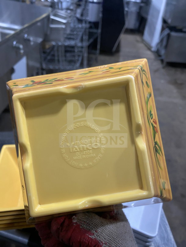 Yellow melamine bowl with square geometric design, marked "Yanco OL-4106, Made in China," microwave and dishwasher safe.