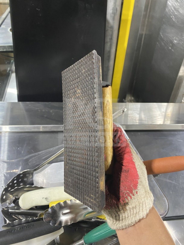 Lot of commercial kitchen smallwares and prep utensils, includes grater, tongs, used condition, various materials.