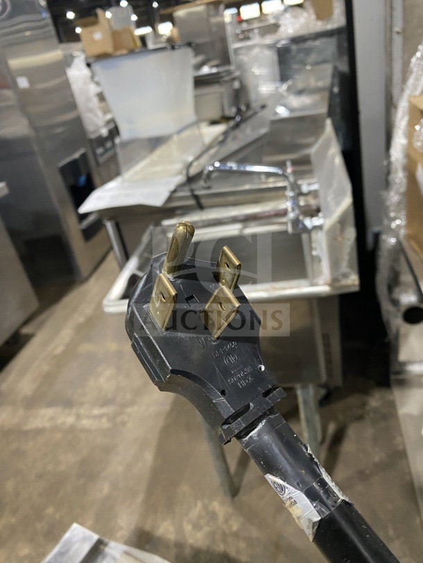 Patriot PTG24E countertop grill plug, 110V/240V, 1 Phase, from the Platinum Series, showing prong detail and label.