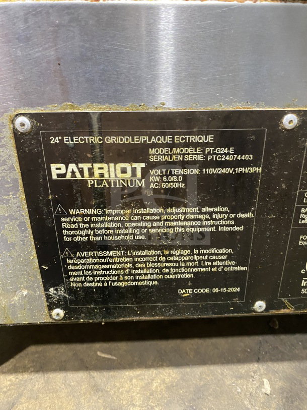 Patriot PTG24E electric griddle, stainless steel, Model PTG24E, SN PTC24074403, 110V/240V, 1 Phase, on legs, working condition.