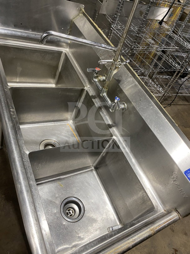 L&J stainless steel 3-bay dishwashing sink with dual drain boards, wash/rinse/sanitize sections, on legs, used condition.