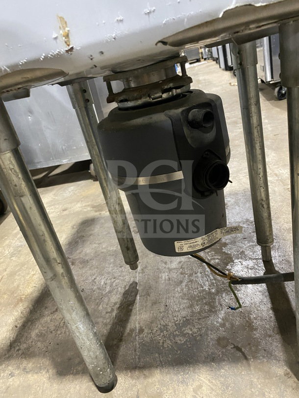 KCS commercial stainless steel 1-compartment prep sink with integrated garbage disposal, splash-mount faucet, on sturdy legs.