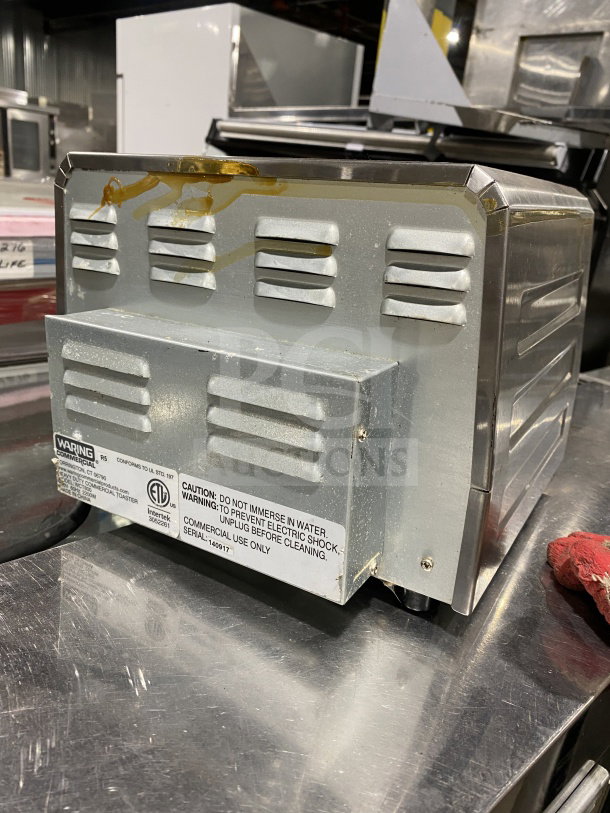 Waring Commercial Stainless Steel 4-Slice Toaster, Model WCT800, SN: 140917. Used condition, 120V, on legs, with visible usage wear.