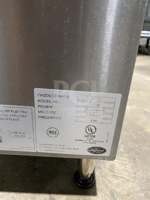 Auction item: 2024 Globe PF16E stainless steel electric deep fat fryer. Features backsplash, frying basket, and legs. 208/240V, NSF, UL listed.