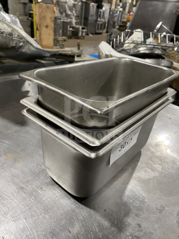 Winco SPJL-306 stainless steel third-size anti-jamming hotel pan, 6" deep, shown stacked, in good condition.