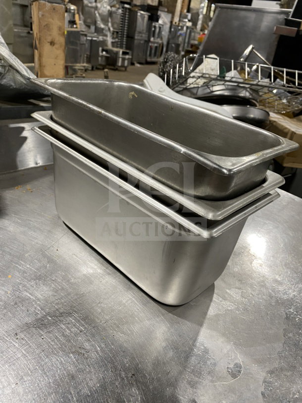 Winco SPJL-306 stainless steel third-size 6" deep anti-jamming hotel pan, good condition, stackable design.