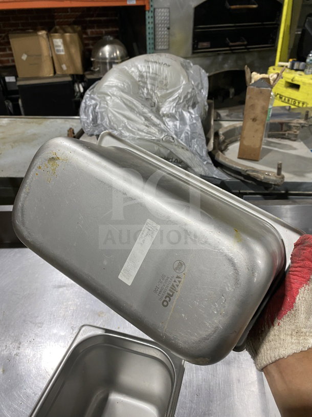 Winco stainless steel third-size 6" deep anti-jamming hotel pan, model SPJL-306. Used condition, visible logo and label.