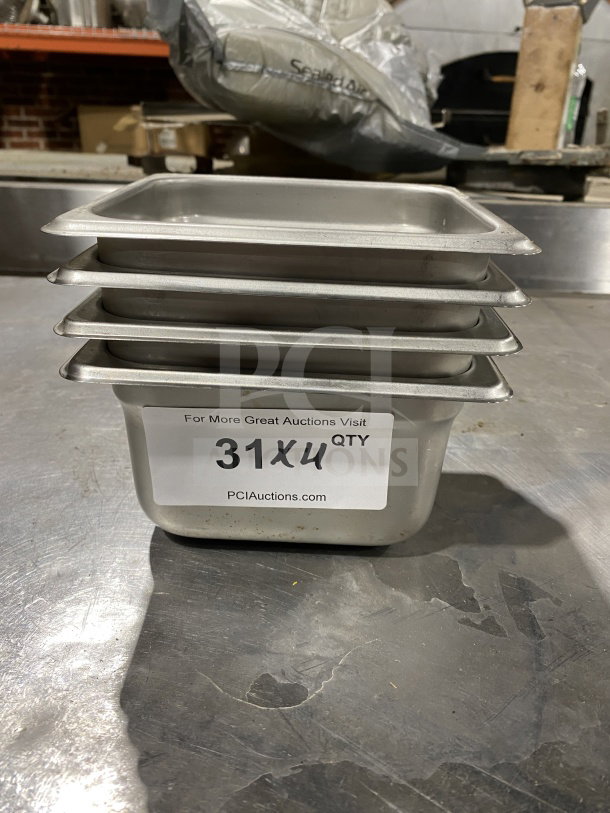 Winco SPJL-604 stainless steel half-size anti-jam steamtable pan. Set of four, commercial grade, good condition. Marked "31Xu QTY."