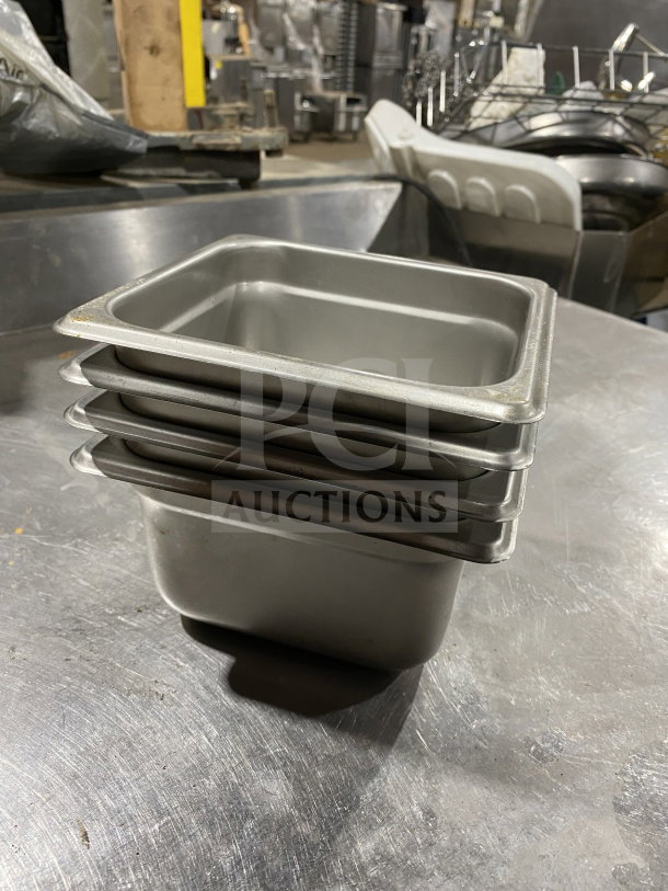 Winco SPJL604 stainless steel half-size anti-jam steamtable pan stack, commercial-grade, used, excellent condition.