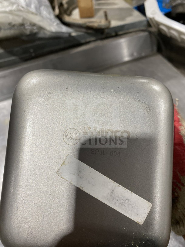 Winco SPJL-604 stainless steel half-size anti-jam hotel pan, NSF certified, label visible, minor wear.
