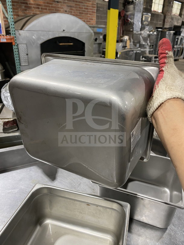 Vollrath 30262 commercial stainless steel half-size steam pan. Visible label. Good condition. Durable and versatile.