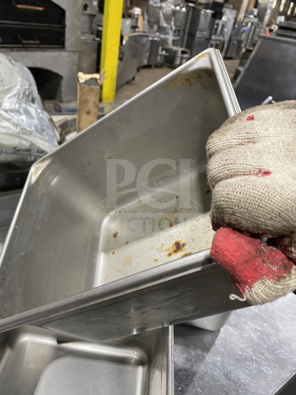 Vollrath Commercial Stainless Steel Half Size Super Steam Pan, Model 30262, showing signs of wear.