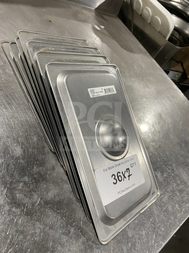 Winco SPSCQ stainless steel 1/4-size steam table pan covers, recessed handle, durable, slightly used, 36 pieces, bid quantity 7X.