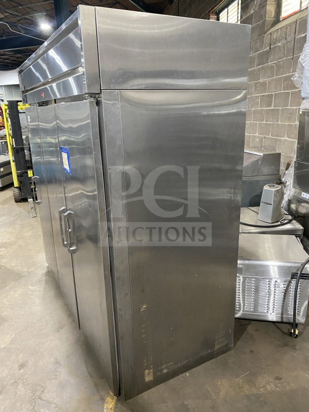 Glenco XL Series EB 3-door stainless steel commercial refrigerator, Model SLS74TE, with chrome wire rack, used condition.