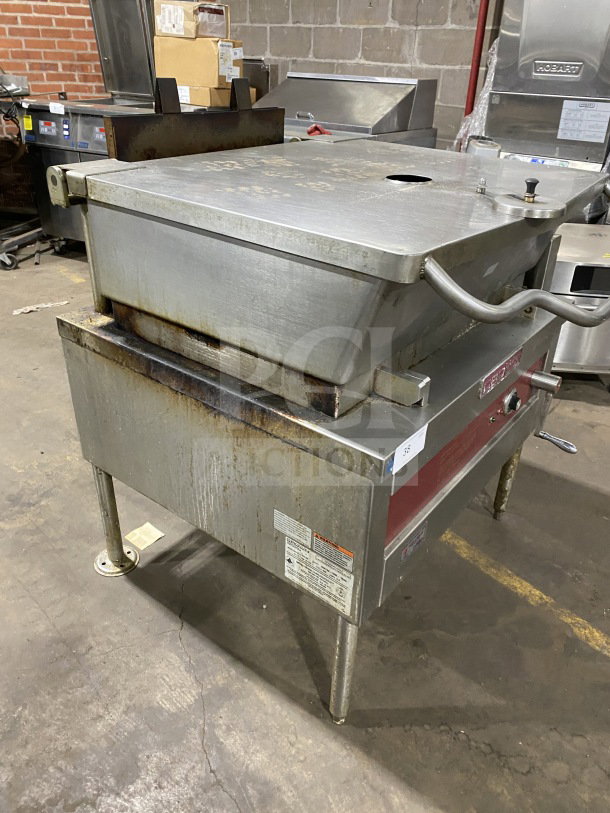 Crown GS-30 30 Gal. stainless steel steam tilt skillet, natural gas, measurement marks, strainer, on legs, SN: 104144-7RR1344.