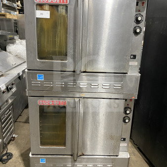 Blodgett stainless steel double stacked convection oven, gas-powered, Energy Star certified, with wired rack, on casters.