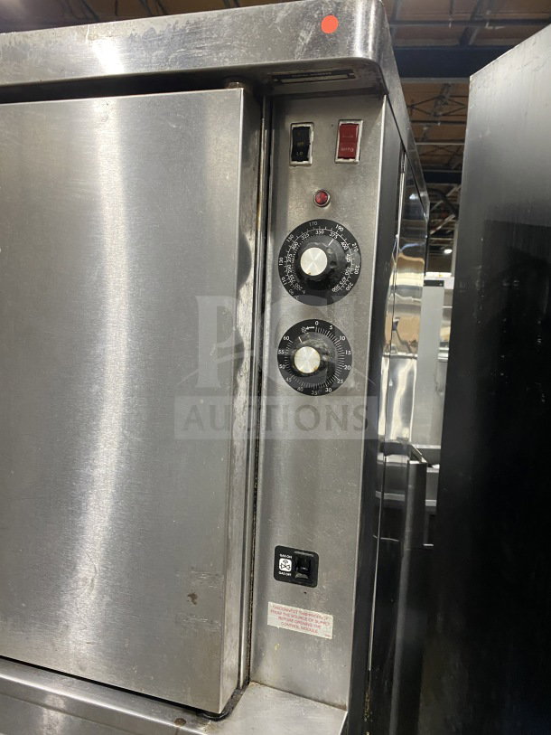 Blodgett commercial stainless steel double-stacked convection oven, gas-powered, Energy Star certified, with wired rack and casters.