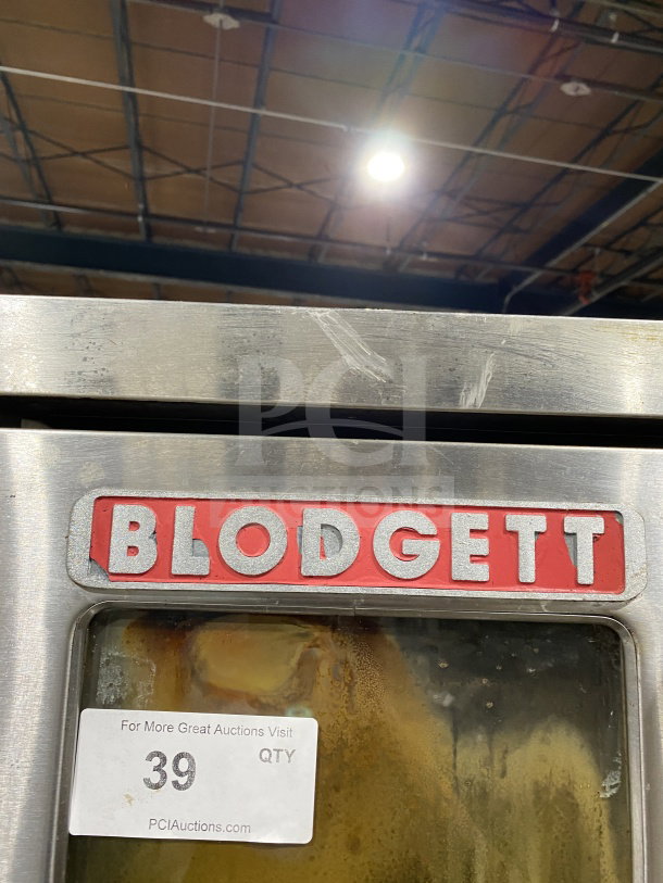 Blodgett commercial stainless steel gas convection oven, double stacked, Energy Star certified, on casters, with wired rack.